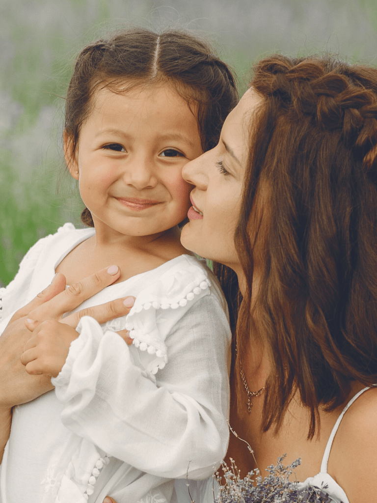 Diverse multigenerational women smiling outdoors